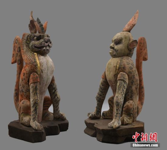 圖為慕容智墓出土鎮(zhèn)墓獸。 中新社發(fā) 甘肅省文物局 供圖